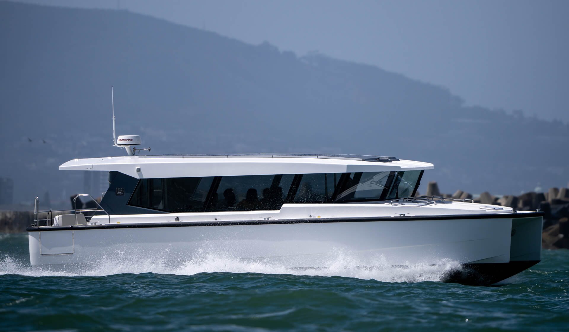 The 370 Luxury Shuttle underway in profile
